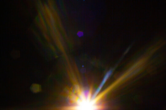 Sun flare on the black background