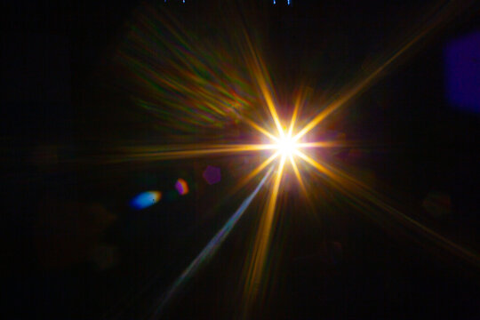 Sun flare on the black background