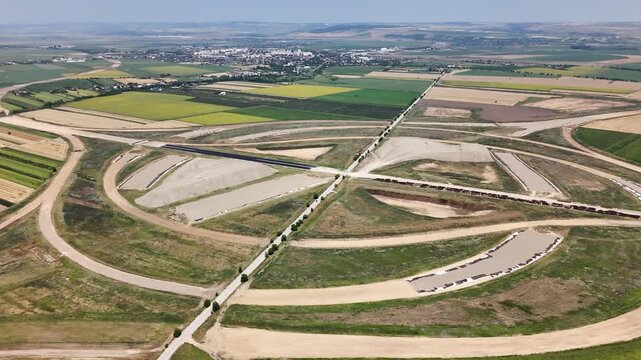 Aerial view of the future A7 and A8 motorway interchange near Pașcani, Romania, showing large highway construction connecting major transport corridors