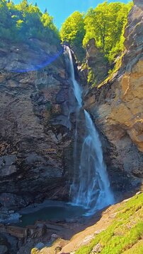 Reichenbach Falls In Switzerland During Spring Season Featuring Powerful Waterfalls, Mountain Scenery, Forest Views, Stunning Alpine Landscape. Natural Beauty, Fresh Green Nature, Famous Destination
