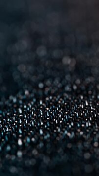 Macro view of dark indigo denim fabric texture with shifting focus and depth of field.
