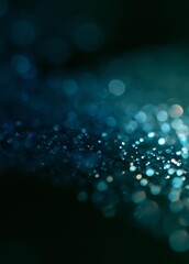 Fototapeta premium Close-up of a dark blue background with small white dots scattered across it. the dots are of different sizes and shapes, creating a bokeh effect.