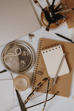 Aesthetic Kraft Paper Stationery Desk Setup Decorated With Pearl Jewelry Tray And Art Brushes