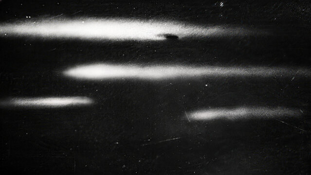 Horizontal White Film Scan Streaks and Scratches on Black Background