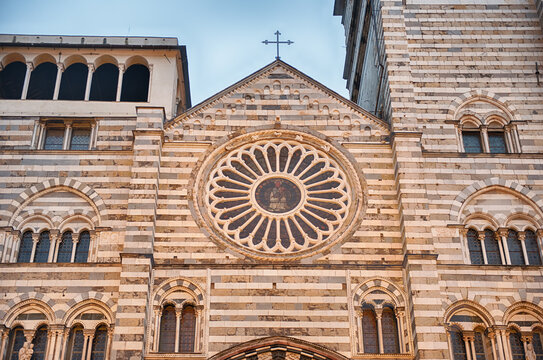 Genoa Cathedral facade and tower with surrounding buildings