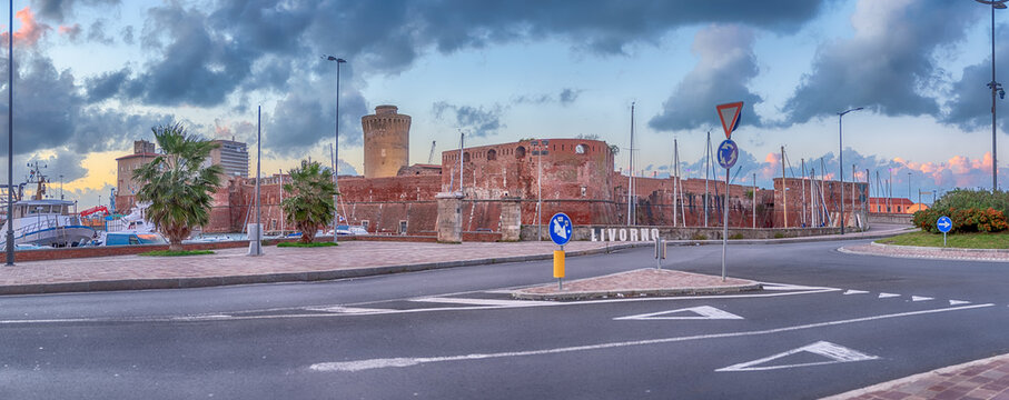 Fortezza Vecchia with cloudy sky and harbor, Livorno, Italy