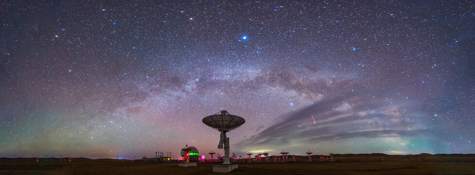 radio telescope on the background of stellar tracks, The observatory's radio telescope