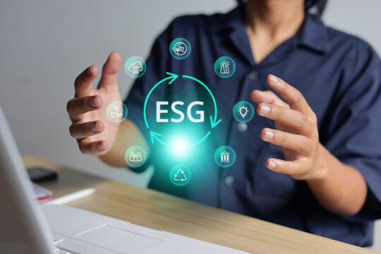 Person Hand Gesturing Around Environmental Social Governance Virtual Graphics Front Laptop Desk