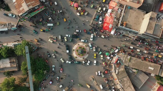 Aerial Drone Footage of Busy City Crossroad with Street Vendors in Rawalpindi