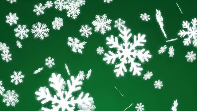 White snowflakes falling on green background