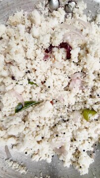 Idli Upma Recipe , close up slow mo ,upma falling
