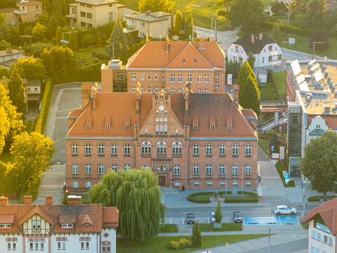 Old town hall building in środa wielkopolska, poland, surrounded by architecture
