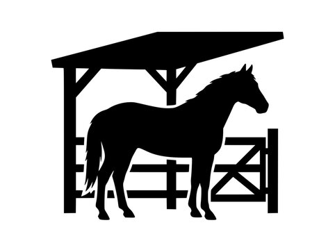 Horse silhouette standing in front of stable shelter and farm fence gate