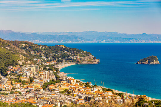 Aerial panoramic view of the coast of Spotorno, Bergeggi Island, Torre del Mare, Liguria, province of Savona, Italy. Riviera dei Fiori. Western Riviera. Ligurian Sea
