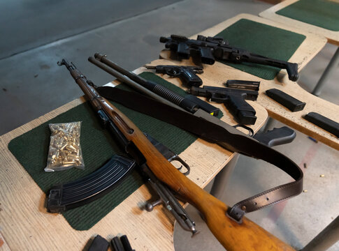 Guns on the table in shooting range