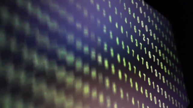 Abstract digital data stream green binary code on dark screen computer