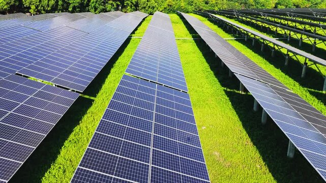 Low drone flight through parallel rows of solar panels