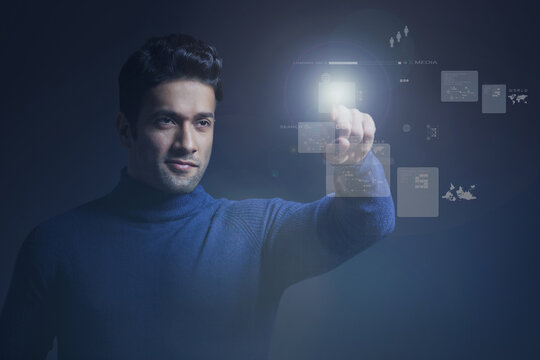 Businessman giving high tech presentation