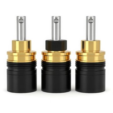 Three brass electrical connectors close-up isolated on white background