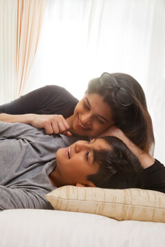 Mother and son sleeping together 