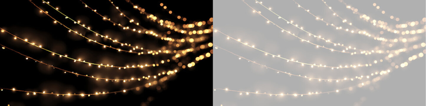Diagonally draped golden string lights on black and transparent backdrop. Glowing fairy lights overlay with warm bokeh light effect
