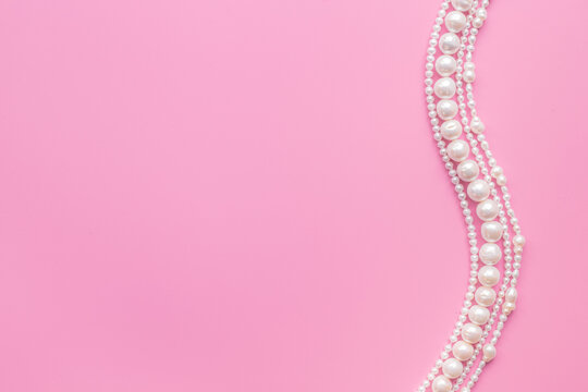 Natural white pearls - beads for jewelry, top view. Precious and elegance concept background