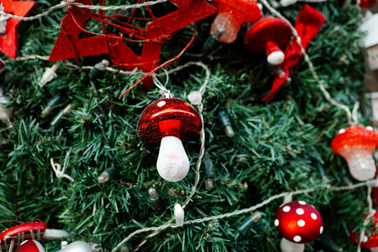 Christmas Tree Decorated With Mushroom Ornaments.Christmas lights and decorations. atmosphere of the winter holidays. 