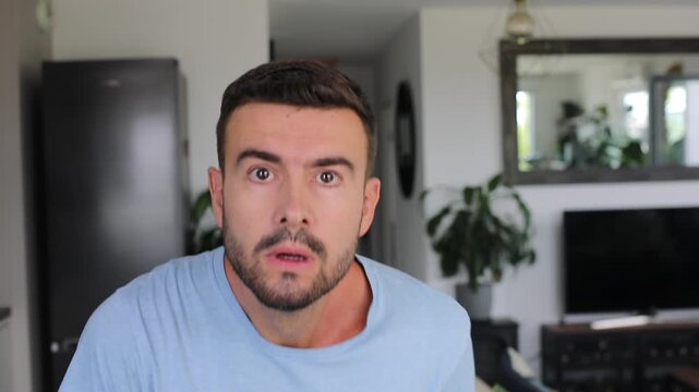 A man gets stressed and looks closely, then sighs because everything is still bad