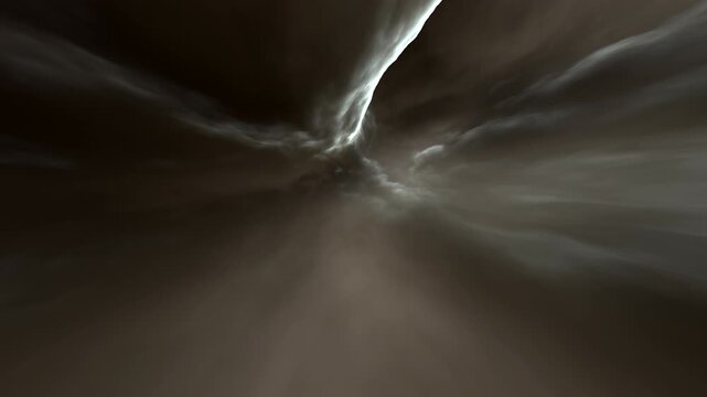 A stylized animation depicting a fast flight through a cosmic nebula vortex with bright white and grey celestial gas formations.