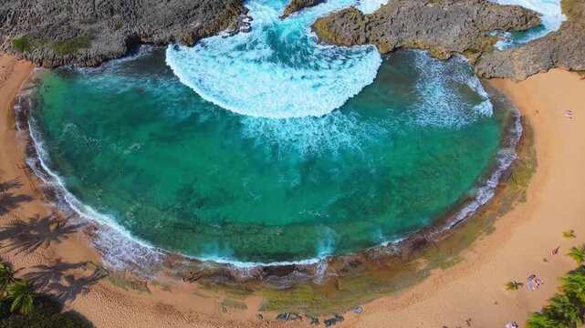 High-altitude drone footage displays the unique geological formations defining Mar Chiquita&rsquo;s protected bay.