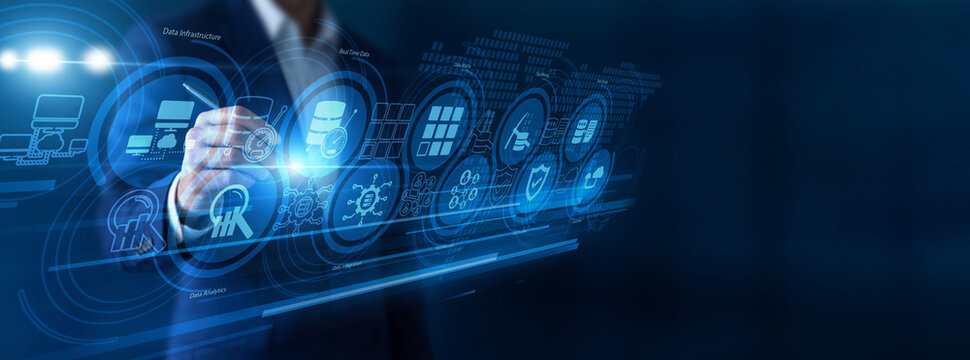 Data analyst pointing the pen evaluating Big Data architectures on a massive virtual screen. Processing petabytes of complex information to extract actionable business insights efficiently.