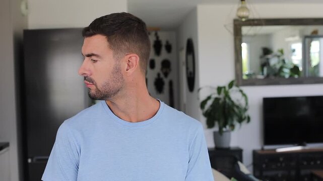 Man comparing options showing that he has a dilemma 