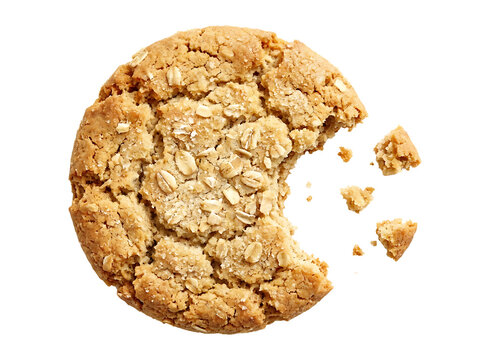 Oatmeal cookie with a bite taken out. Isolated baked snack with crumbs on transparent background