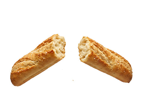 Broken baguette bread isolated on transparent background. Fresh crusty French loaf cut in half.