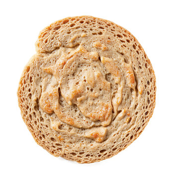 Bread spread toast isolated on a transparent background featuring a round slice with peanut butter for a healthy snack