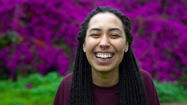 Happy young african woman smiling on camera at city park after yoga class - Healthy lifestyle, millennial girl and happiness concept