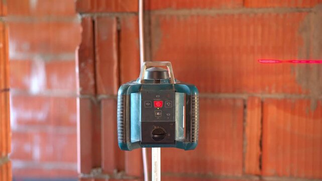 Rotary laser level projecting red line