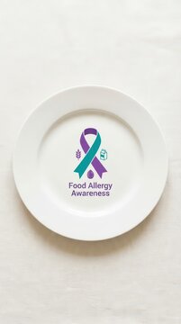 White plate with teal and purple ribbon food allergy awareness graphic for awareness poster and campaign design background promoting allergy education