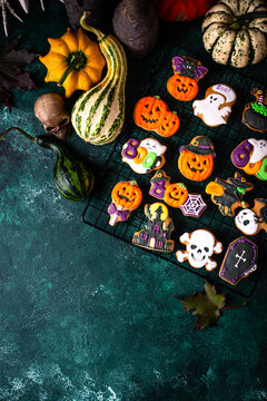 Halloween cookies in shape of ghost, jack-o-lantern and skull