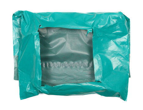Open parcel in cyan plastic bag isolated on white background, clipping path, design element, top view