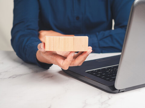 Person Holding Blank Wooden Blocks with Copy Space