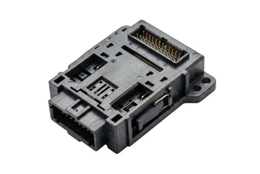 Electronic control unit module with connector pins on black background
