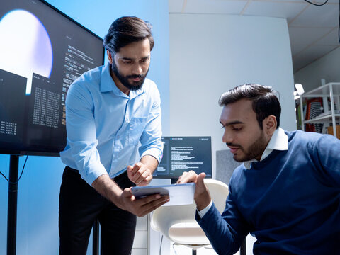 Software engineering use computer working development office are assisting algorithm systems or verifying code. Programmer teamwork using artificial intelligence on laptop analysis or writing coding
