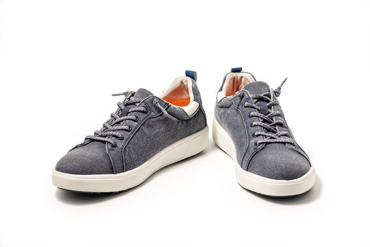 Blue Canvas Sneakers. Sport shoes isolated on white background, clipping path included