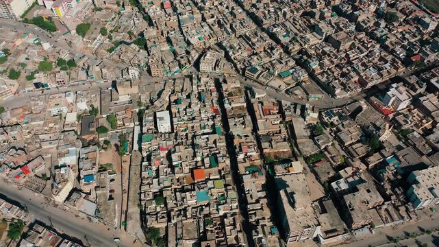 Wide Aerial Shot of Railway Tracks Hospital Complex and Crowded Residential Rooftops in Saddar Rawalpindi
