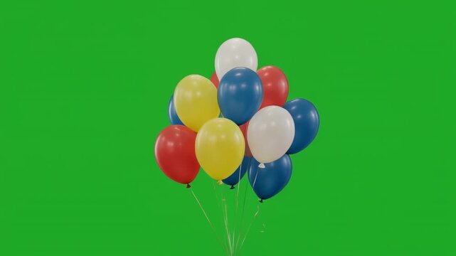 Colorful balloons floating gently against a vibrant green screen background