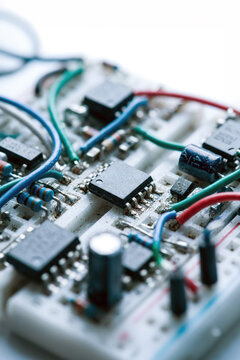 Electronic circuit board with microchips and components on breadboard