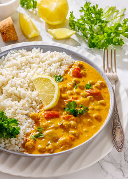indian chole masala with white rice dish