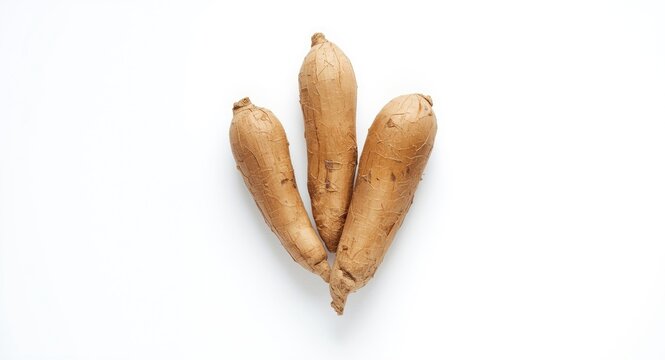 Three Brown Sweet Potatoes Isolated on White Background