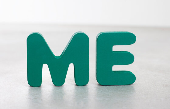 Me concept spelled with colorful wooden alphabet letters